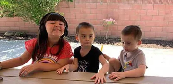 Cody, Colton and Madelyn sitting at a bench