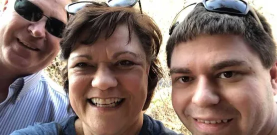 Dan with his parents, Emily and Michael 