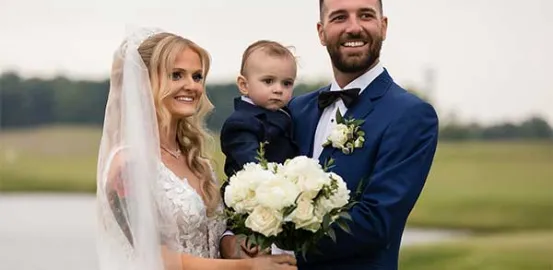 Jack and his parents at their wedding