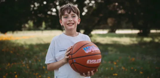 Jude with his Wilson basketball