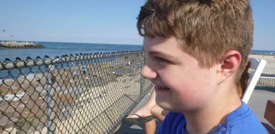 Kimberlee Rutan McCafferty's son Justin at the beach