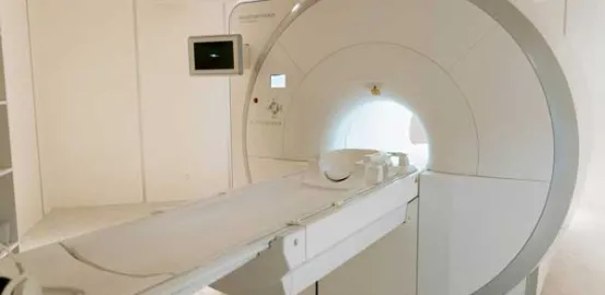 MRI machine in an all white room