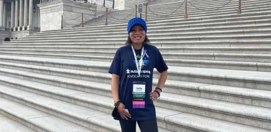 Saida M standing on Capitol steps at 2023 Advocacy Forum in DC