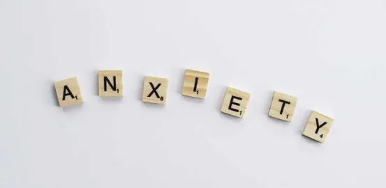 Scrabble letters spelling out the word anxiety