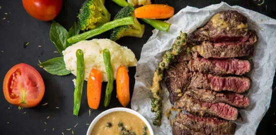 Steak Dinner with a side of vegetables