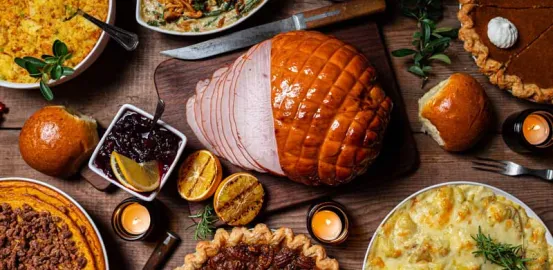 Thanksgiving ham and other foods on a table