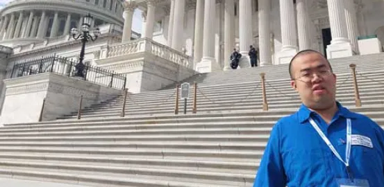 Vincent Feng standing in front of Capitol steps in DC