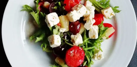 plate of feta and tomato salad