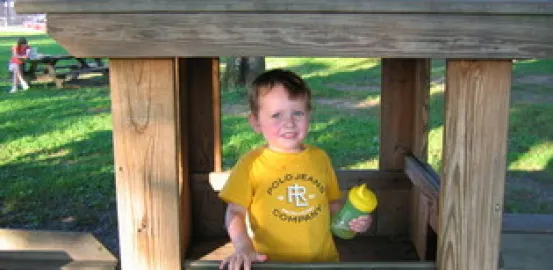 toddler in a yellow shirt