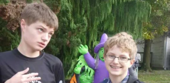 two young boys in Halloween costumes