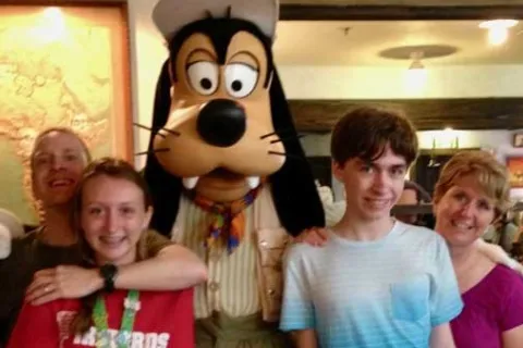 Amy Schinner's family with Goofy