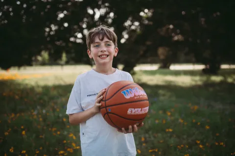 Jude with his Wilson basketball