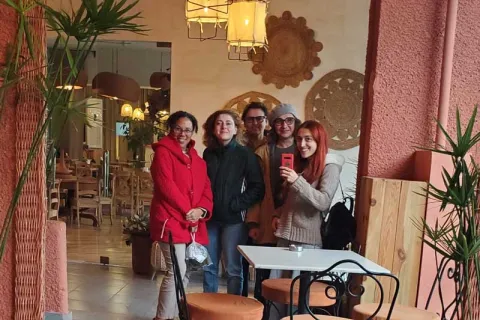 Pam Dixon and friends in a cafe