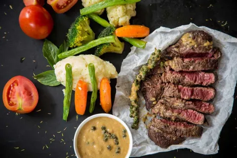 Steak Dinner with a side of vegetables