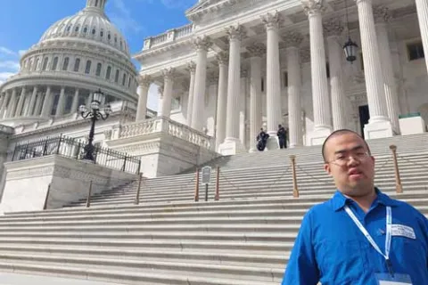 Vincent Feng standing in front of Capitol steps in DC