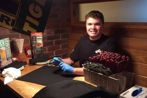 autistic teen working at a restaurant