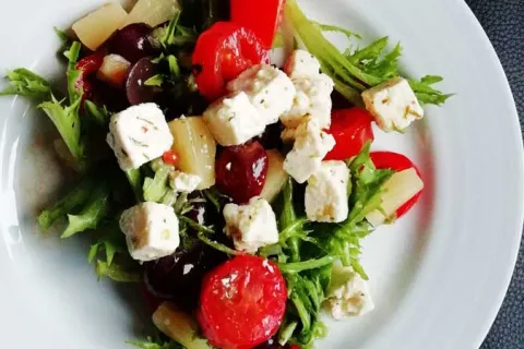 plate of feta and tomato salad