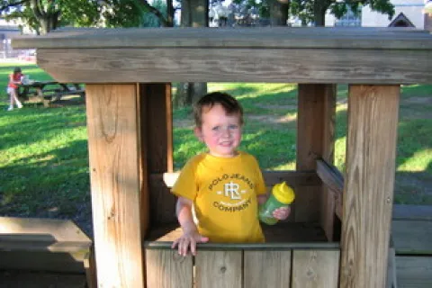 toddler in a yellow shirt