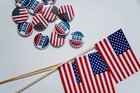 vote buttons and mini American flags