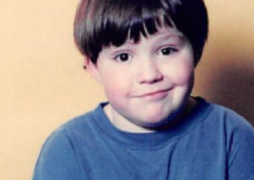 8-year-old Kerry Magro wearing a blue shirt