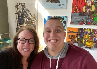 Amy Hess and her son in an art gallery