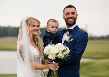 Jack and his parents at their wedding