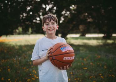 Jude with his Wilson basketball