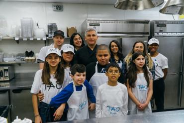 Autistic children in the kitchen of TAO for World Autism Month