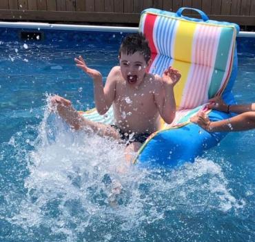 Boston playing in the pool