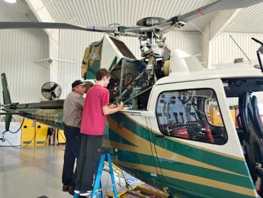 Connor working on a chopper