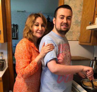 Dea and her nephew in the kitchen