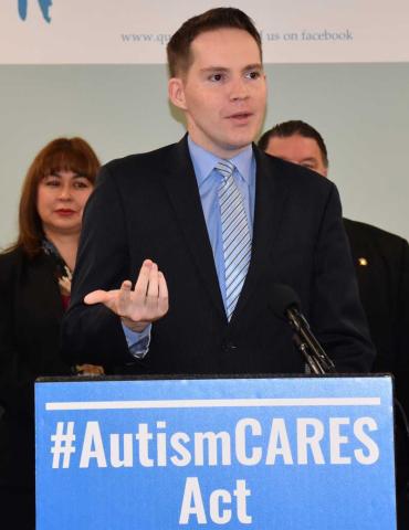 Dr. Kerry Magro speaking at an event for The Autism CARES Act