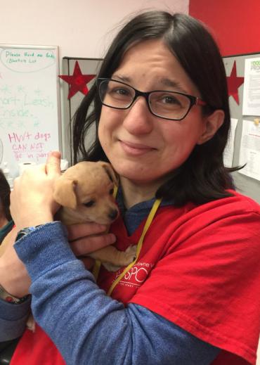 Erin holding a puppy