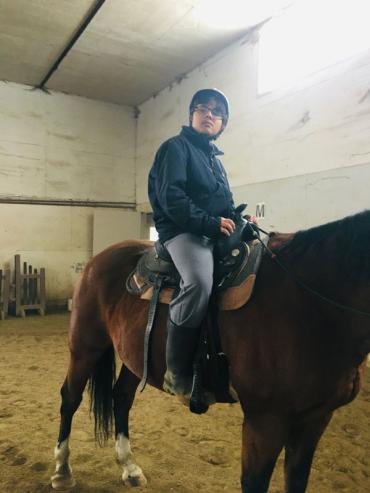 Ishaan riding a horse