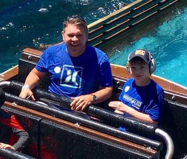 Jackson and his dad on a waterpark ride