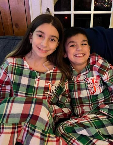 Jeffrey and his sister in matching pajamas