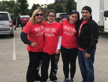 Kaitlyn and her family at an Autism Speaks Walk