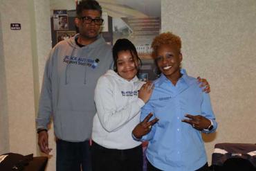 Kimacka Randle with her son and daughter standing next to her