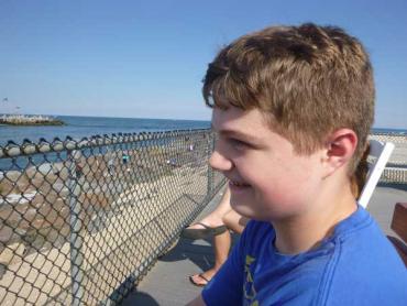 Kimberlee Rutan McCafferty's son Justin at the beach