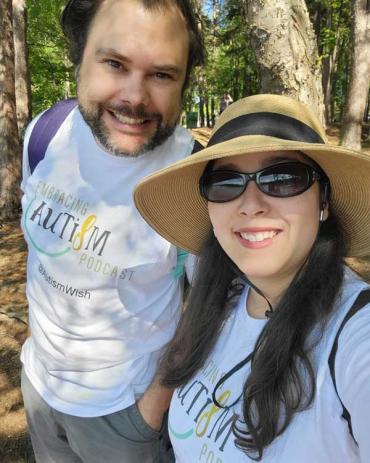 Lia and Matt in the woods