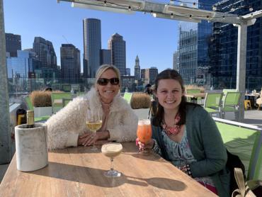 Madison and her mom at a rooftop bar