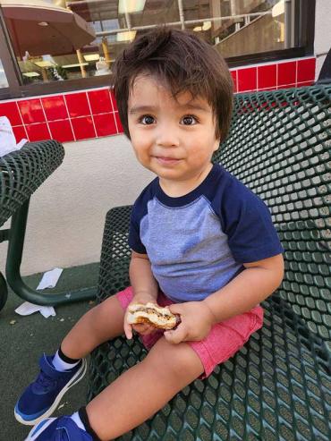 Nico L. sitting at a table