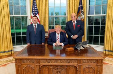 Xavier inside the White House next to former President Trump