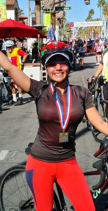 Yadira at the finish line of a bike race