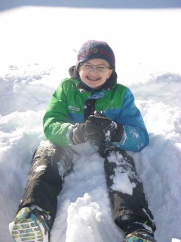 Zachary making a snow angel