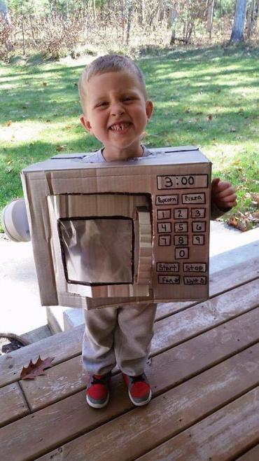 autistic child dressed as a microwave for Halloween