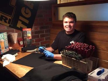 autistic teen working at a restaurant