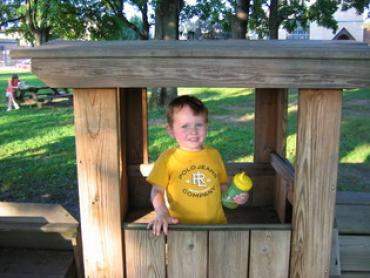 toddler in a yellow shirt