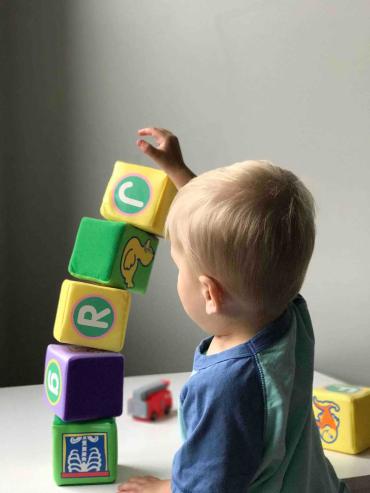 toddler playing with blocks